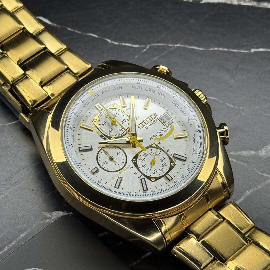 ساعت مچي مردانه کرنوگراف برند سيتيزن CITEZEN مدل 3310 سه موتوره طلايي