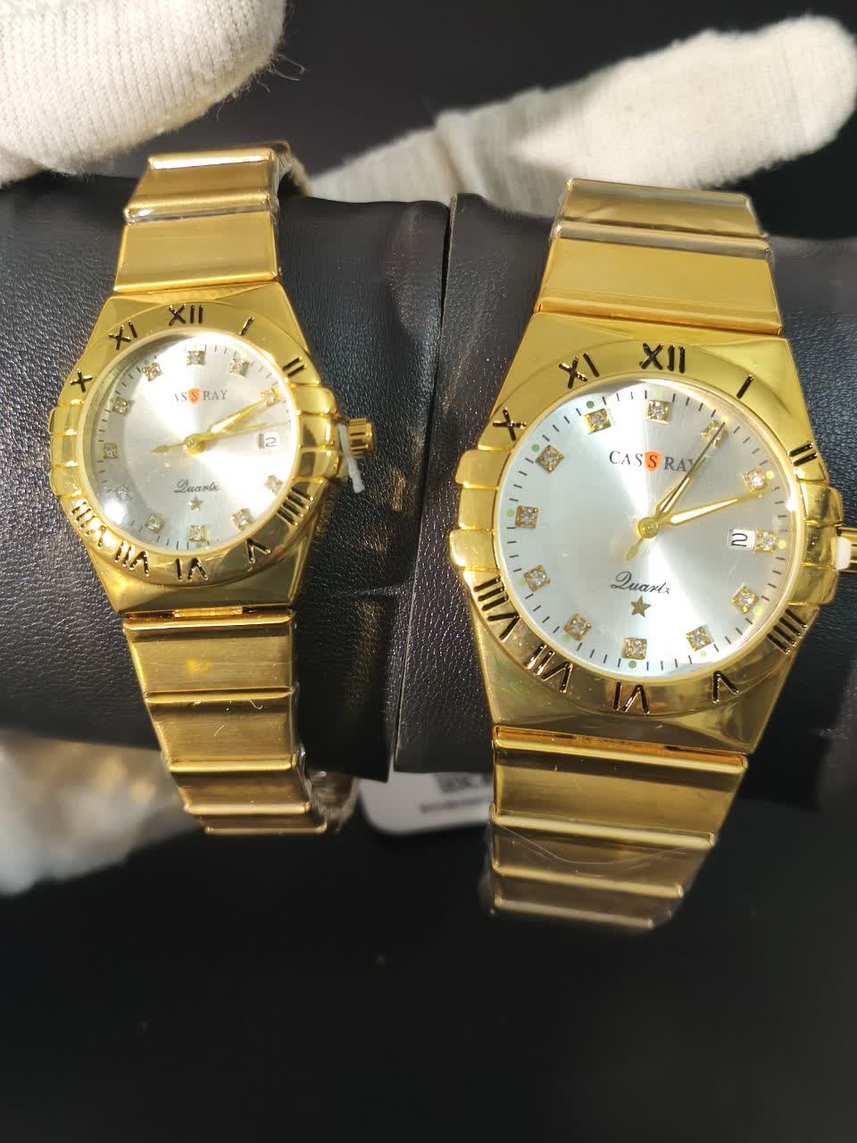 ست ساعت مچي مردانه و زنانه برند کسري طرح اوگا CASSRAY طلايي قفل پروانه اي