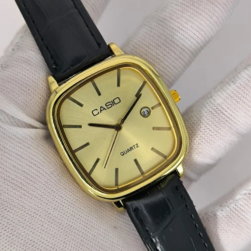 ساعت مچی مردانه کاسیو CASIO اولد مانی بند چرمی ساخت ژاپن رنگ صفحه طلایی